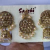 golden earrings and maang tikka set with pearl drops for women