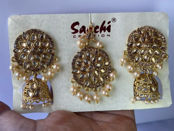golden earrings and maang tikka set with pearl drops for women