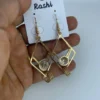 Golden color geometric crystal drop earrings for women